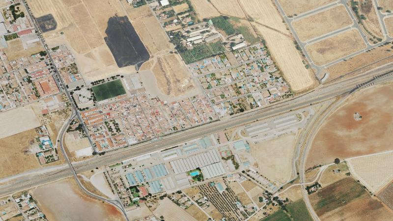 Vista aérea de la Barriada El Higuerón, Córdoba, utilizada como imagen de referencia para la subasta